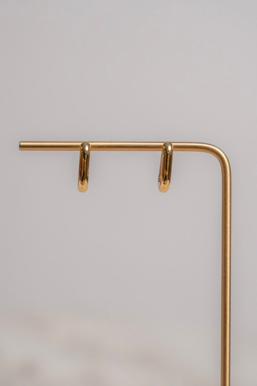 golden huggie hoops - earrings