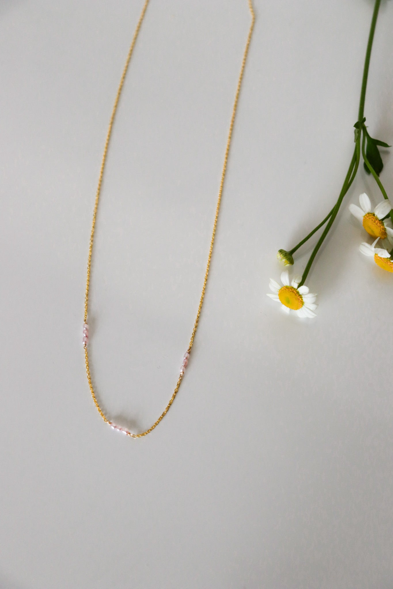 "invisible string" pink pearl choker