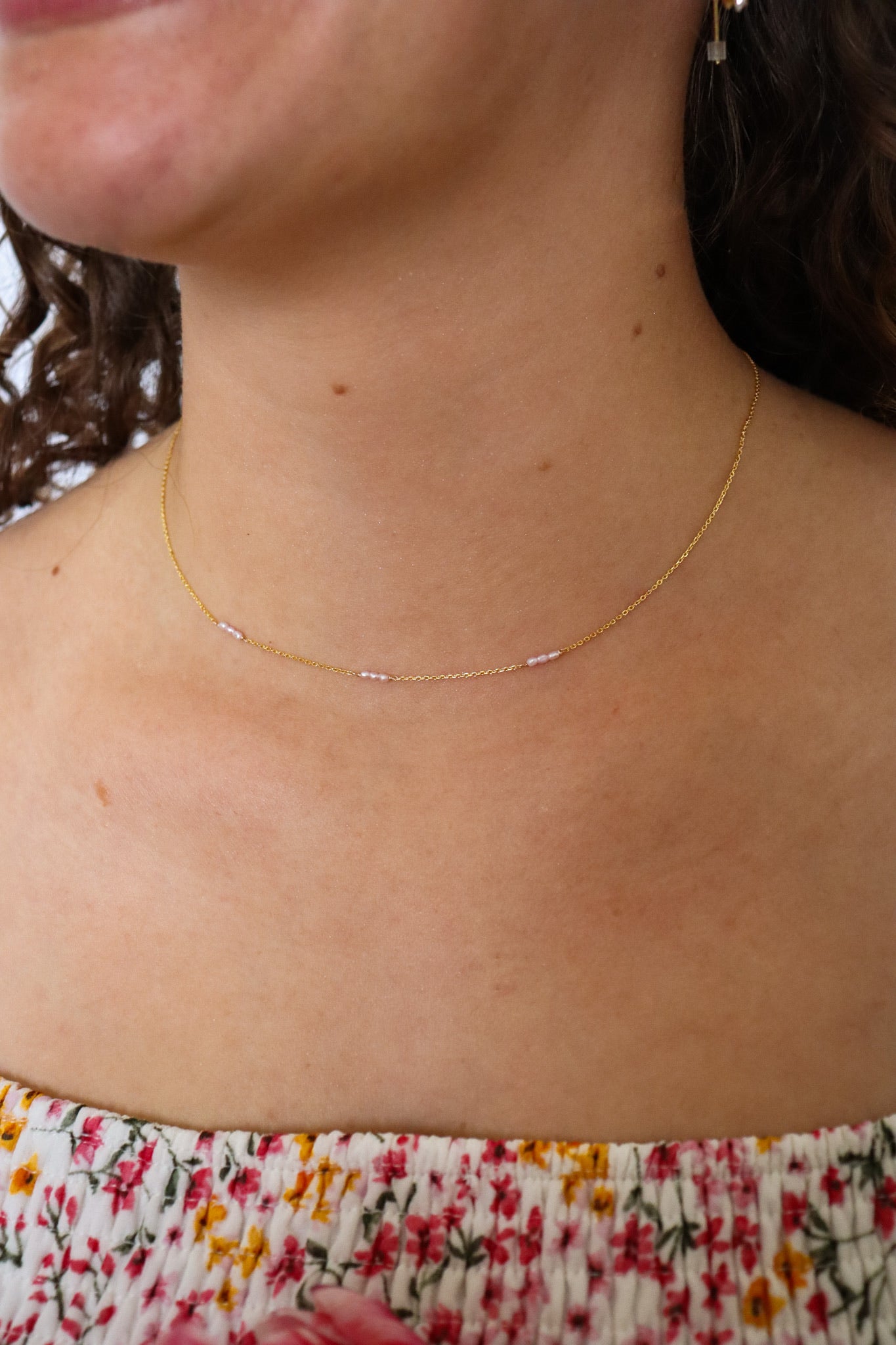 "invisible string" pink pearl choker