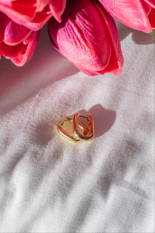 golden huggie hoops - earrings
