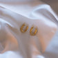 golden huggie hoops - earrings